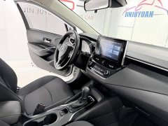Toyota Corolla Dual Engine 1.8L E-CVT Elite Edition - фото 17