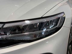 Volkswagen Bora 200TSI DSG Yue Xing Navigation Edition - фото 13