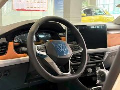 Volkswagen Bora 200TSI DSG Yue Xing Navigation Edition - фото 16