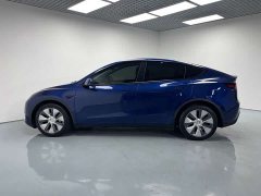 Tesla Model Y standard range rear-wheel drive version - фото 4