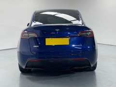 Tesla Model Y standard range rear-wheel drive version - фото 8