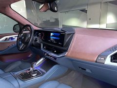 BMW XM 50e - фото 12