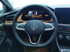 Volkswagen Bora 200TSI DSG Yue Xing Navigation Edition - фото 15